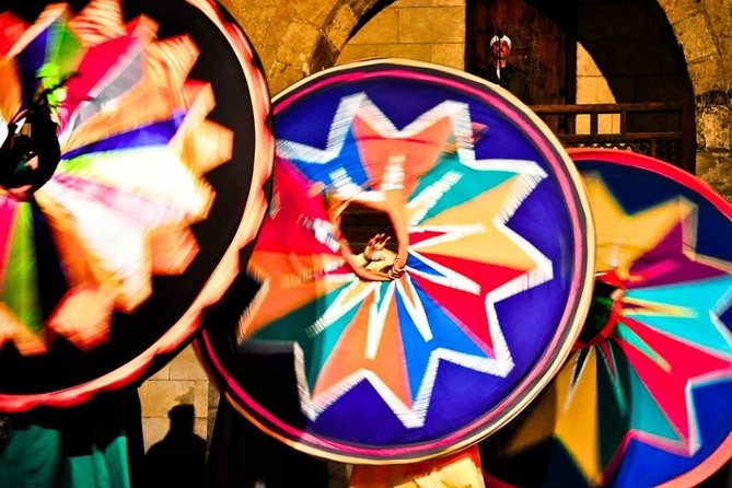 Al Tannoura Egyptian Dance Heritage Show at Wekalet El Ghouri - The one-hour performance: spinning, music, and color
