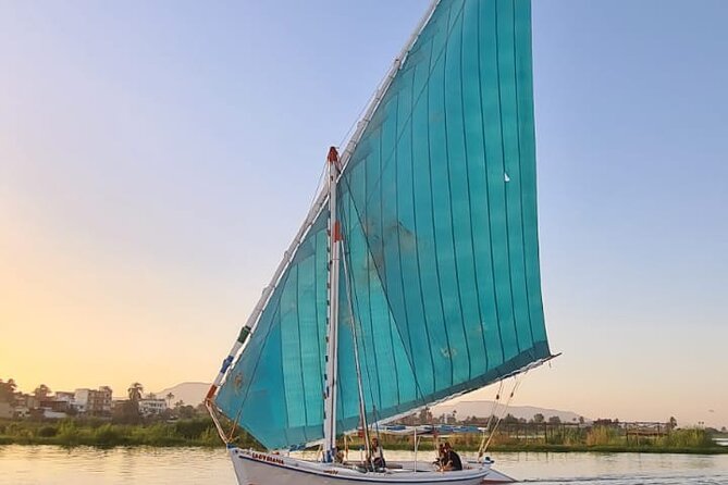 Amazing Sunset sailing by Felucca in Luxor -2 Hours (Private) - Boarding a traditional felucca on the Nile