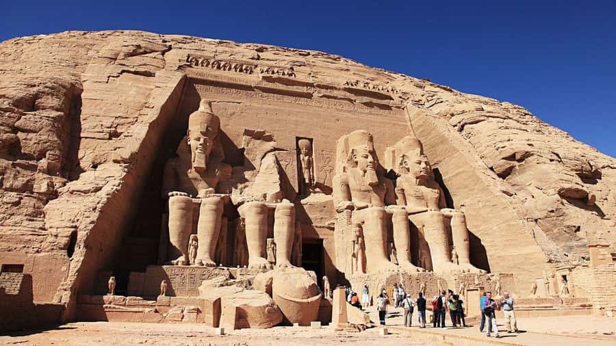 Aswan: Abu Simbel Group Tour with Guide and Entrance Fees - Reaching the Great Temple of Ramses II