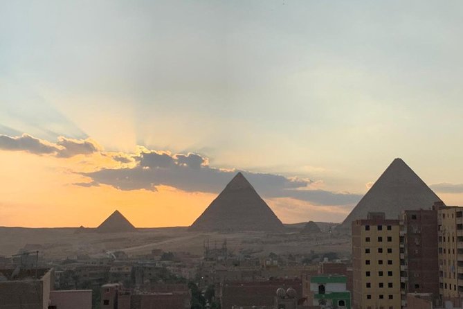 Best Full-Day Tour to Giza Pyramids Egyptian Museum and Bazaar - Giza Pyramids: three royal monuments and the Sphinx