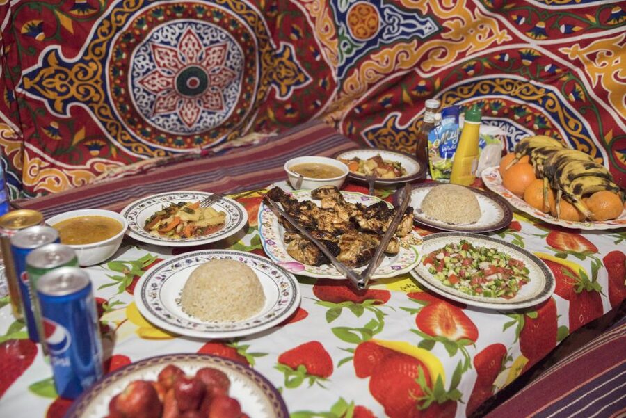 Cairo: 2-Day Bahariya Oasis Camp and Desert Tour - Dinner, firelight, and a cold night outside