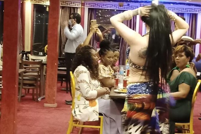 Cairo Dinner Cruise in Nile River With Belly Dancer & Tanora show - Belly dancing, music, and the Tanoura show