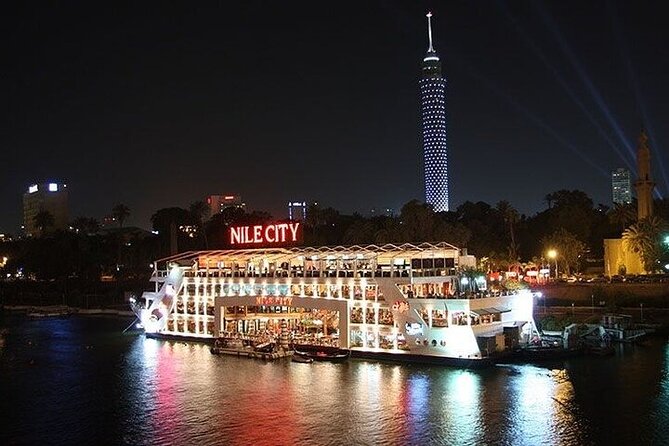 Cairo: Dinner Cruise on the Nile River with Entertainment - Cairo from the water after sunset