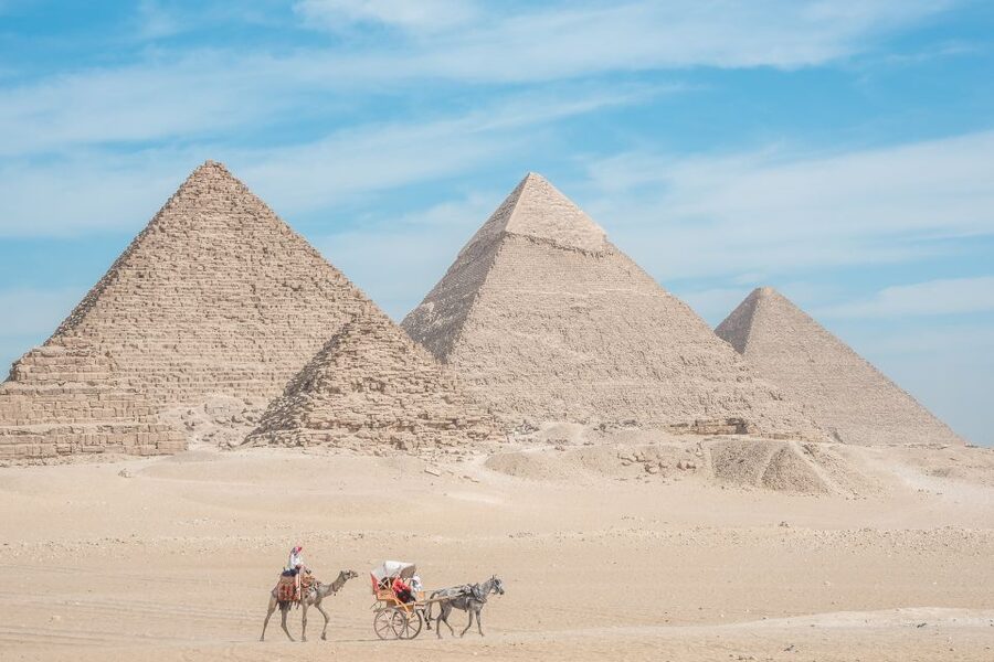 Cairo: Half Day Pyramids Tour by Camel or Horse Carriage - Choosing between a camel and horse carriage