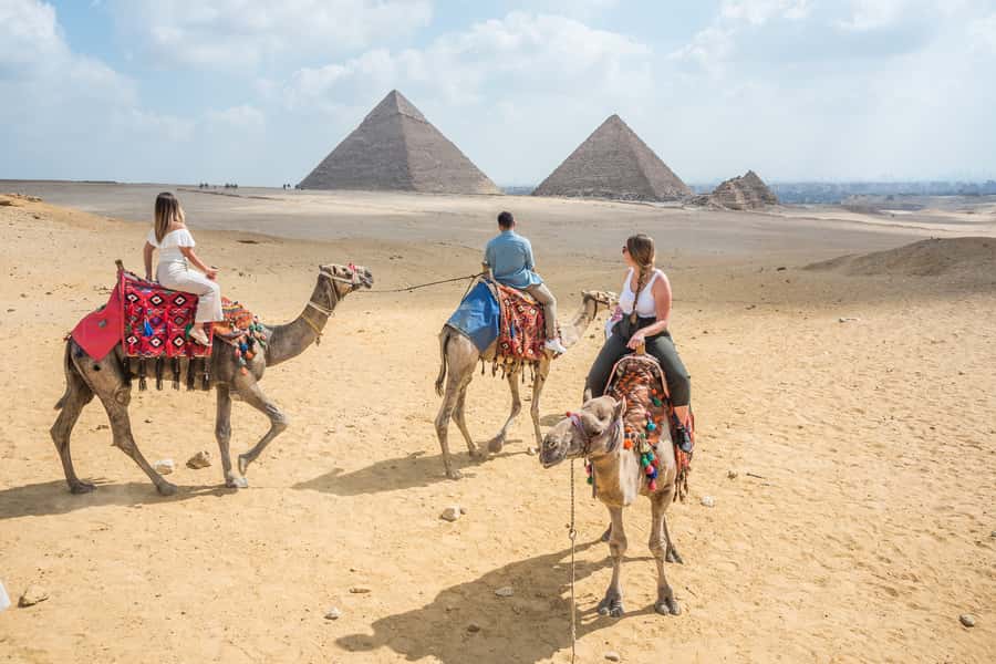 Cairo: Half Day Pyramids Tour by Camel or Horse Carriage - Hotel pickup and the ride to Giza