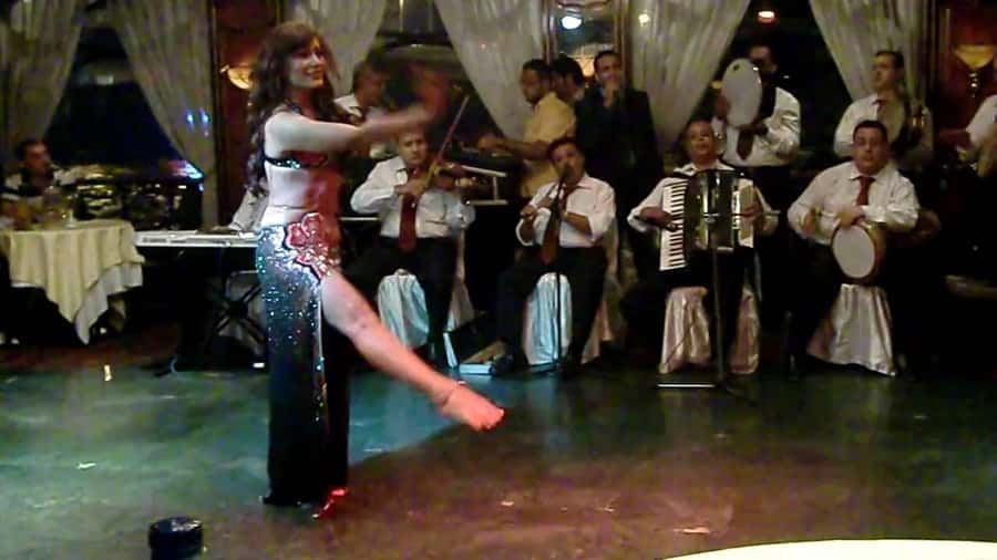 Cairo: Nile Dinner Cruise with Belly Dancer Show with Pickup - Boarding the boat and settling in for dinner