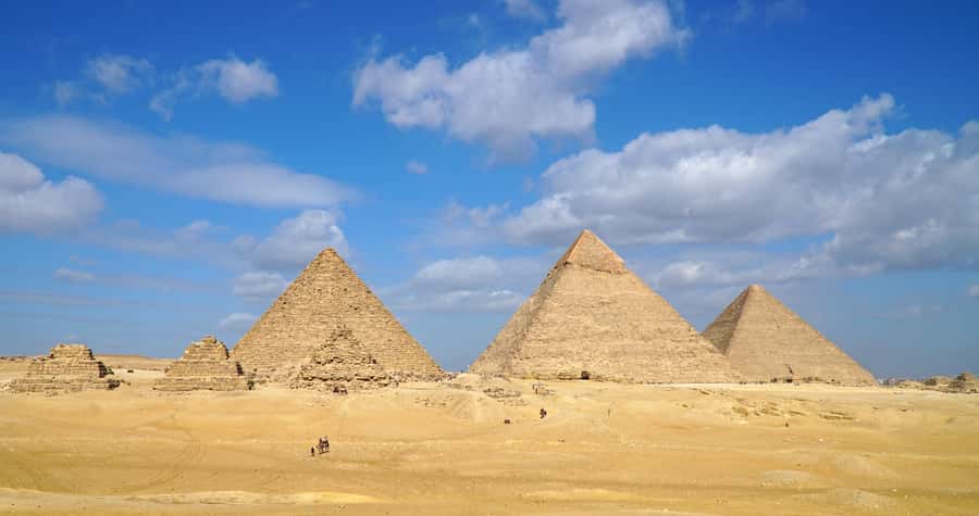 Cairo: Private Half-Day Pyramids Tour with Photographer - A camel ride with the pyramids in the frame