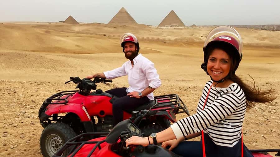 Cairo: Private Quad Bike Desert Tour with Pyramids & Sunset - Riding toward the pyramids from the desert
