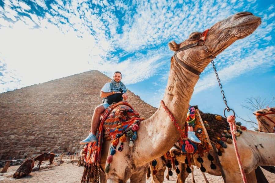 Cairo: Pyramids & Great Sphinx Private Tour with Camel Ride - The Great Sphinx adds a different mood