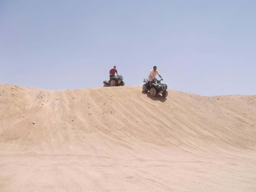 Desert Sunset Quad Bike ATV for 50Km, Oriental Show, Dinner, - A Bedouin-style camp and a short camel ride