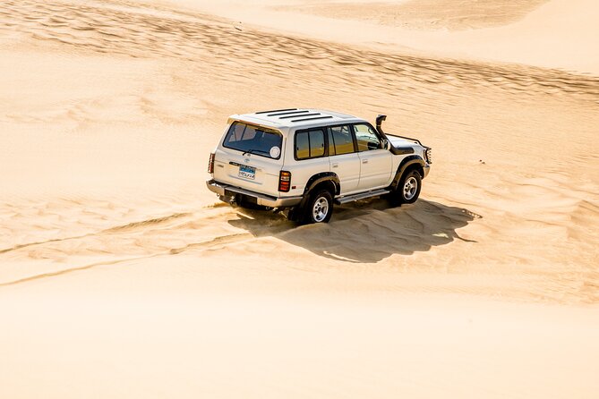 From Cairo 4x4 Safari, Camel Ride, Magic Lake, Waterfalls & Lunch - Waterfalls, lake views, and Mudawara Mountains