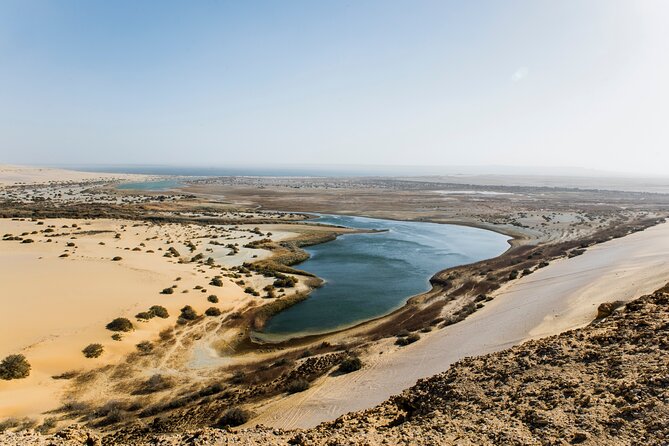 From Cairo: Desert Safari, Waterfalls, Sand boarding and Camel ride with Lunch - What is included, and what is not