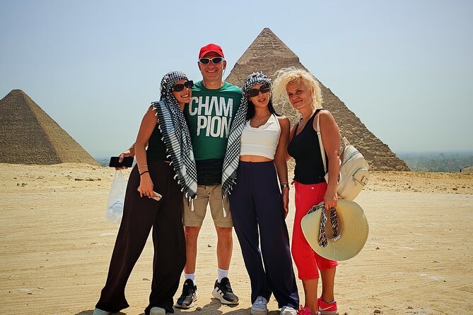 Giza pyramids all inclusive lunch, fees,camel&inside 3rd pyramid - The Sphinx, with the pyramids as a backdrop