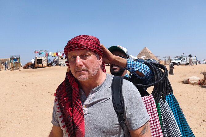Half day Pyramids of Giza and Sphinx with Camel ride - Lunch, transport, and the human side of the day