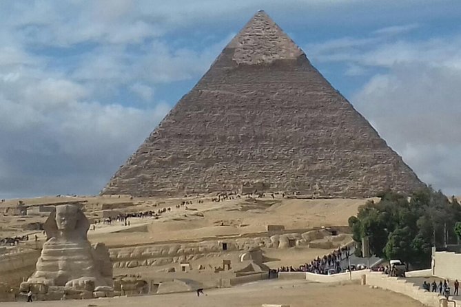 Half Day Tour To Giza Pyramids & Sphinx From Cairo Airport - Khafre still wears part of its original cap