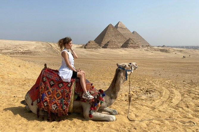 Half Day Tour to Giza pyramids, sphinx Lunch and camel ridding - An early start from Cairo or Giza