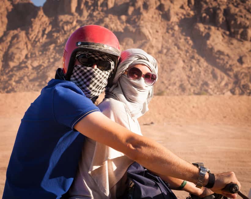 Hurghada: ATV Quad, Jeep and Buggy Safari with BBQ Dinner - Camels, sunset, and the Bedouin village
