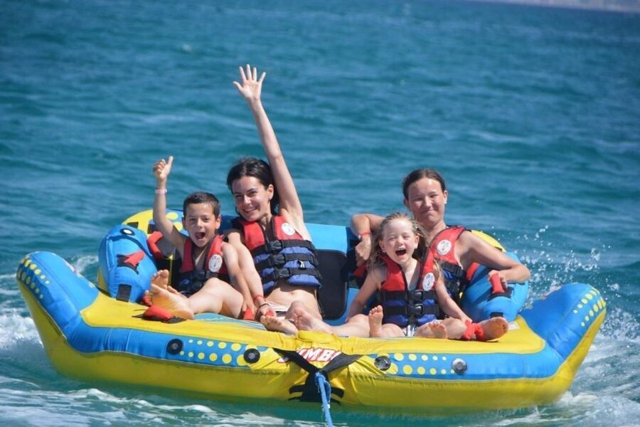 Hurghada: Dolphin Cruise with Snorkeling & Buffet Lunch - Banana boat, sofa boat, and the social mood