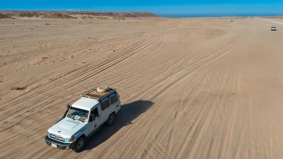Hurghada: Jeep Safari with Camel Ride, Dinner and Show - Sunset, dinner, and the evening show