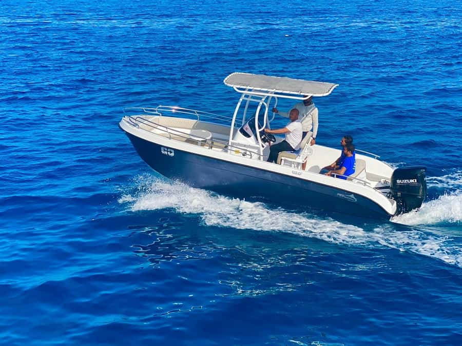 Hurghada: Orange Bay Dolphin Watching, Snorkeling & Lunch - Two snorkeling stops in open water