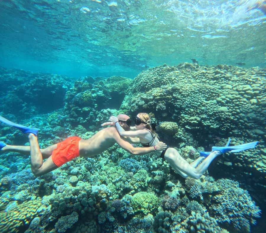 Hurghada: Orange Bay Island with breakfast, lunch & watersports - Banana boat and sofa rides add a playful break
