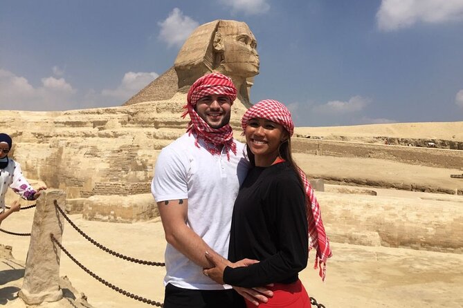 Luxury Private Tour Giza pyramids ,Sphinx ,Camel Rid and Lunch - A 15-minute camel ride with the pyramids behind you