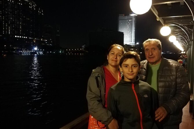 Nile Dinner Cruise in Cairo With Belly Dancing and Transfer - Belly dancing, Arabic music, and Tanoura spinning