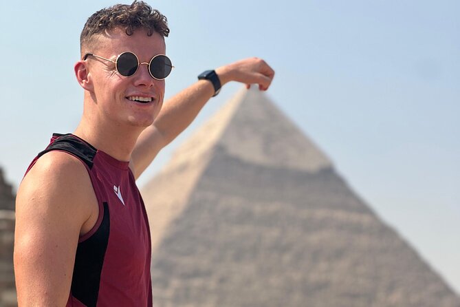 Private Day Pyramids and Grand Egyptian Museum with free camel - The complimentary camel ride near the monuments