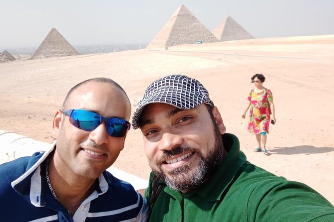 Private Half Day Tour to Giza Pyramids and Sphinx with Camel ride - Facing the Great Pyramid of Cheops