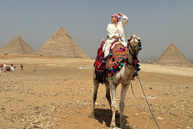 Private tour Giza Pyramids ,sphinx & camel ride all included - Khufu gives the tour its great opening moment