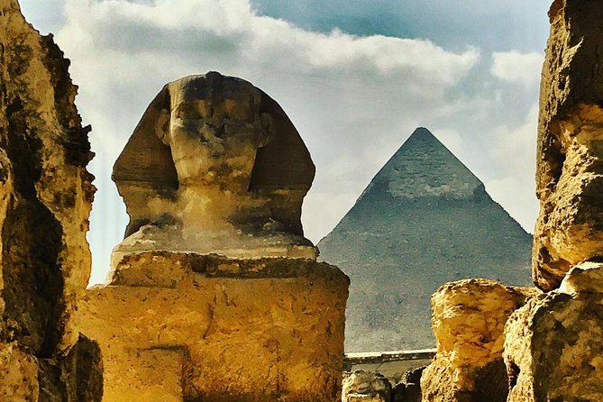 Private Tour to Giza Pyramids Sphinx with Camel Riding - Lunch brings the tour back to everyday Egypt
