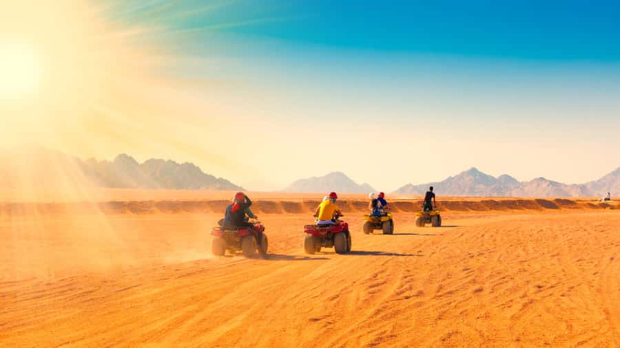 Sharm El Sheikh: Quad Biking trip with Authentic Bedouin Tea - Getting on the quad bike