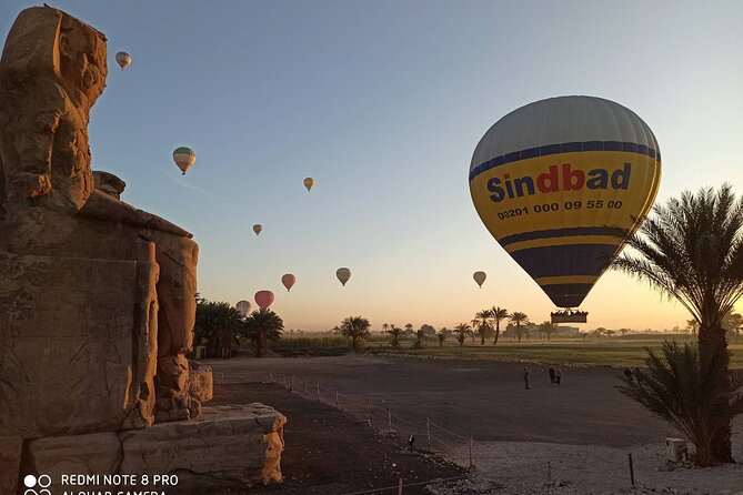 Sunrise Hot Air Balloon Ride Over Luxor - Watching the balloons prepare for takeoff